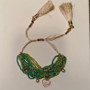 Green Beaded Bracelet with Gold Accents